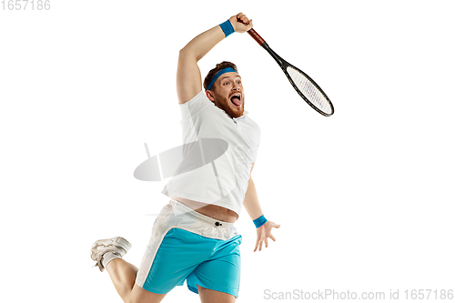 Image of Funny emotions of professional tennis player isolated on white studio background, excitement in game