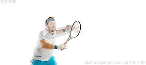 Image of Funny emotions of professional tennis player isolated on white studio background, excitement in game