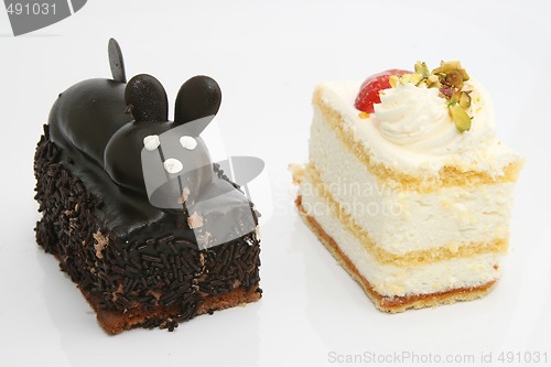 Image of two cream cakes