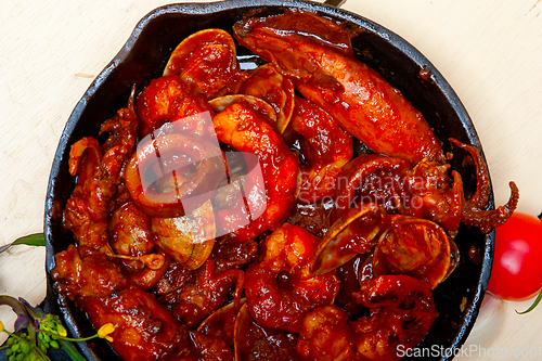 Image of fresh seafoos stew on an iron skillet