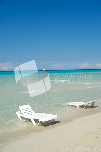 Image of Sunloungers at exotic beach