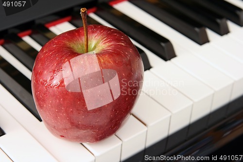 Image of apple and piano