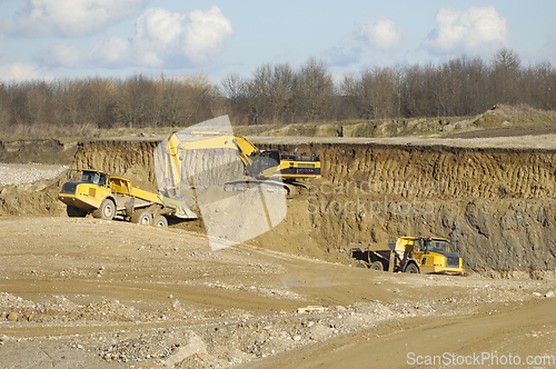 Image of Yellow dump truck in mine