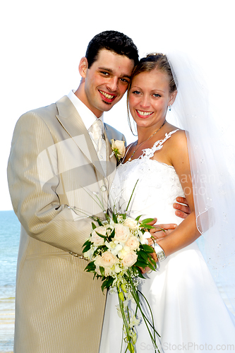 Image of Happy wedding couple smiling