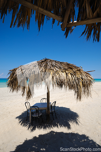 Image of Parasol on exotic beach