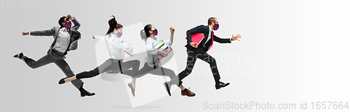 Image of Happy office workers in face masks jumping and dancing in casual clothes or suit isolated on studio background. Creative collage.