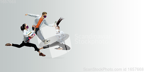 Image of Happy office workers in face masks jumping and dancing in casual clothes or suit isolated on studio background. Creative collage.