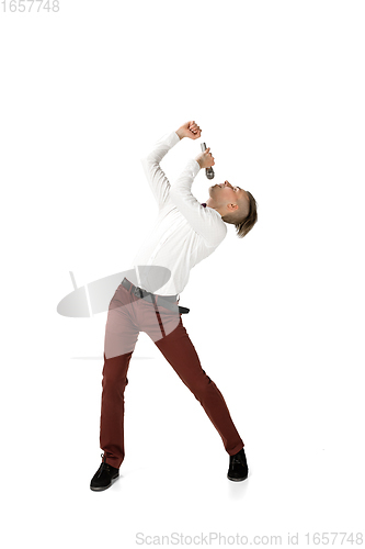 Image of Happy young man dancing in casual clothes or suit, remaking legendary moves of celebrity from culture history