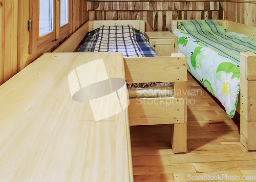 Image of Bedroom in a Wooden Chalet