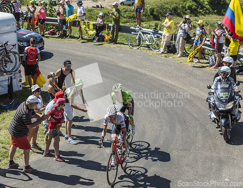 Image of Two Cyclists in Jura Mountains - Tour de France 2016