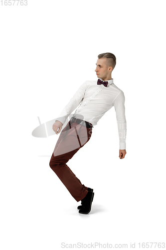 Image of Happy young man dancing in casual clothes or suit, remaking legendary moves of celebrity from culture history