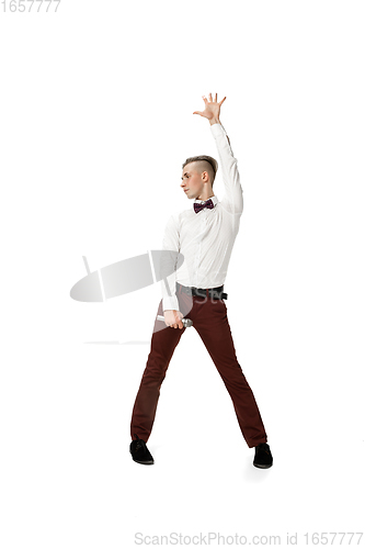 Image of Happy young man dancing in casual clothes or suit, remaking legendary moves of celebrity from culture history