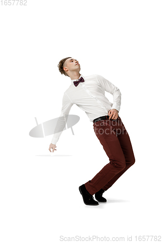 Image of Happy young man dancing in casual clothes or suit, remaking legendary moves of celebrity from culture history