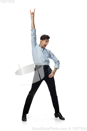 Image of Happy young man dancing in casual clothes or suit, remaking legendary moves of celebrity from culture history