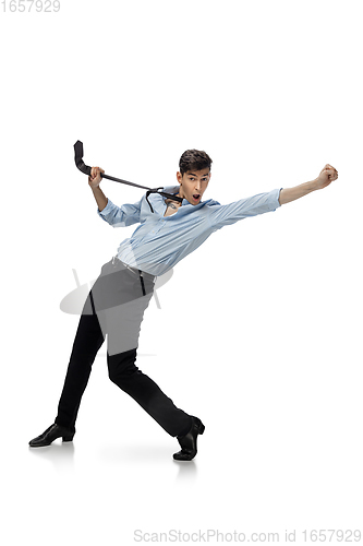 Image of Happy young man dancing in casual clothes or suit, remaking legendary moves of celebrity from culture history