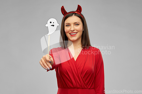 Image of happy woman in red halloween costume of devil