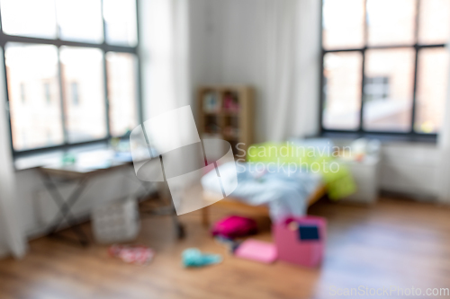 Image of blurred view of messy home or kid's room