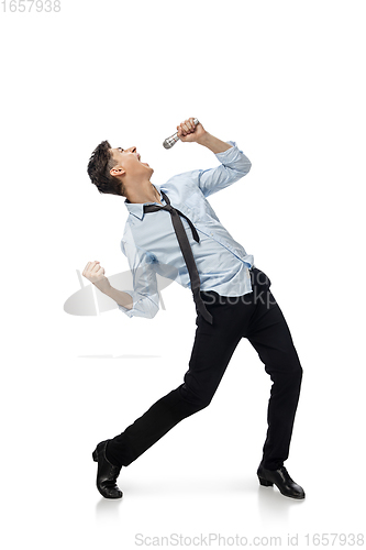 Image of Happy young man dancing in casual clothes or suit, remaking legendary moves of celebrity from culture history