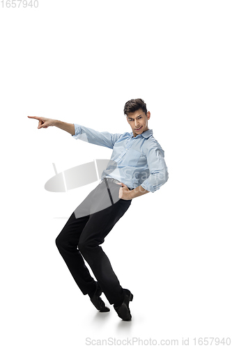 Image of Happy young man dancing in casual clothes or suit, remaking legendary moves of celebrity from culture history