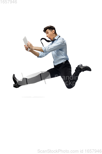 Image of Happy young man dancing in casual clothes or suit, remaking legendary moves of celebrity from culture history