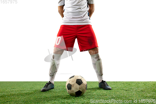 Image of Close up legs of professional soccer, football player fighting for ball on field isolated on white background