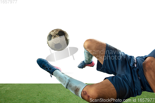 Image of Close up legs of professional soccer, football player fighting for ball on field isolated on white background