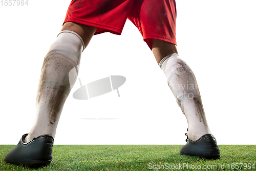 Image of Close up legs of professional soccer, football player fighting for ball on field isolated on white background