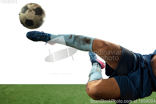 Image of Close up legs of professional soccer, football player fighting for ball on field isolated on white background