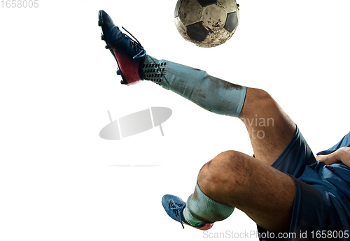 Image of Close up legs of professional soccer, football player fighting for ball on field isolated on white background