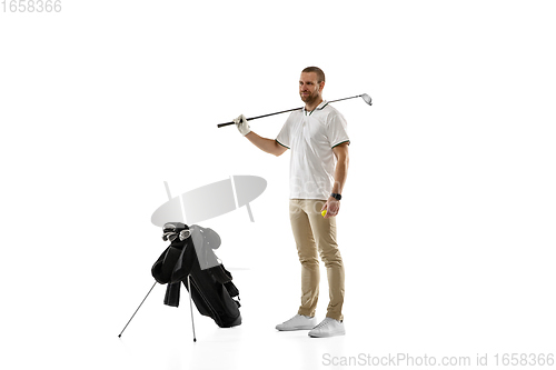 Image of Golf player in a white shirt practicing, playing isolated on white studio background