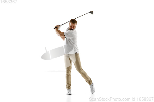 Image of Golf player in a white shirt taking a swing isolated on white studio background