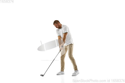 Image of Golf player in a white shirt practicing, playing isolated on white studio background