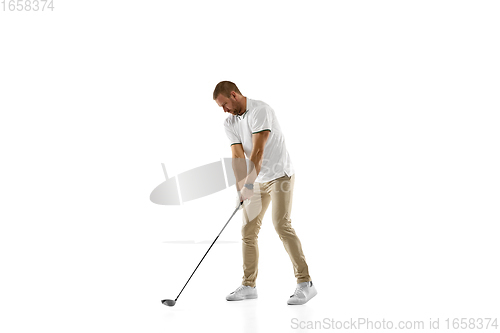 Image of Golf player in a white shirt practicing, playing isolated on white studio background