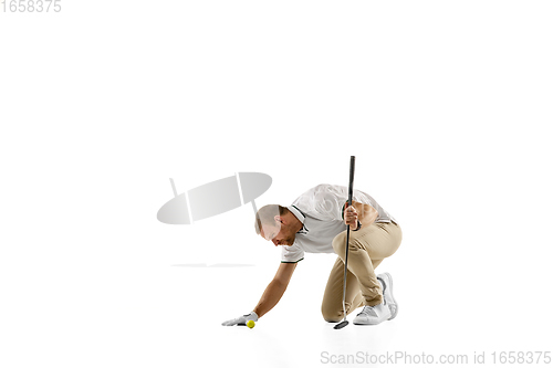 Image of Golf player in a white shirt practicing, playing isolated on white studio background