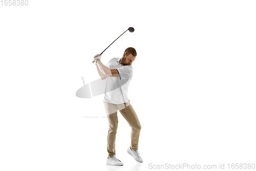 Image of Golf player in a white shirt taking a swing isolated on white studio background