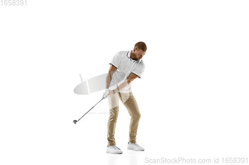 Image of Golf player in a white shirt practicing, playing isolated on white studio background
