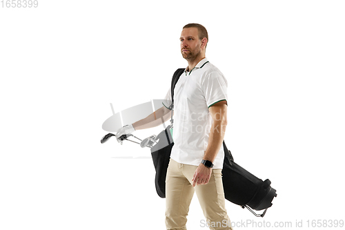 Image of Golf player in a white shirt practicing, playing isolated on white studio background