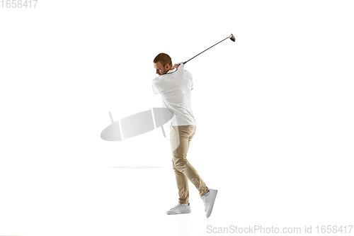 Image of Golf player in a white shirt taking a swing isolated on white studio background