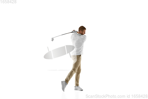 Image of Golf player in a white shirt taking a swing isolated on white studio background