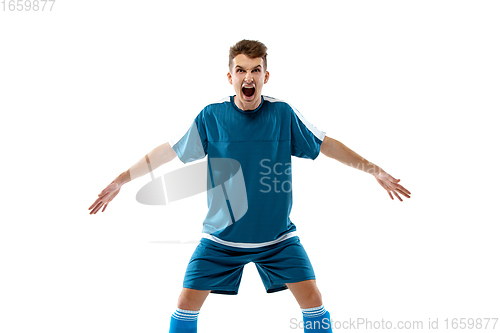 Image of Funny emotions of professional soccer player isolated on white studio background, excitement in game