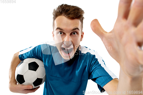 Image of Funny emotions of professional soccer player isolated on white studio background, excitement in game