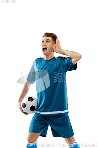 Image of Funny emotions of professional soccer player isolated on white studio background, excitement in game