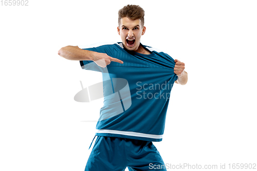 Image of Funny emotions of professional soccer player isolated on white studio background, excitement in game