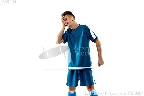Image of Funny emotions of professional soccer player isolated on white studio background, excitement in game