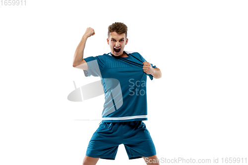 Image of Funny emotions of professional soccer player isolated on white studio background, excitement in game