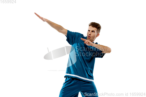 Image of Funny emotions of professional soccer player isolated on white studio background, excitement in game