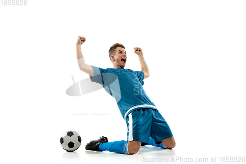 Image of Funny emotions of professional soccer player isolated on white studio background, excitement in game