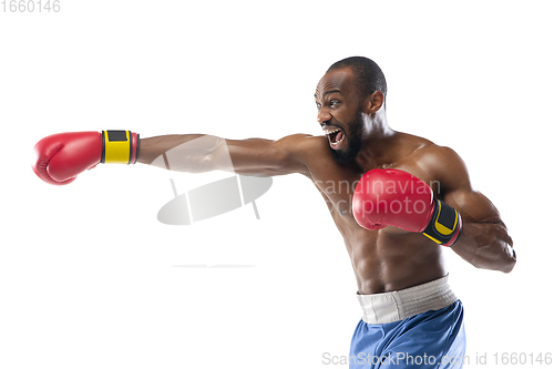 Image of Bright emotions of professional boxer isolated on white studio background, excitement in game