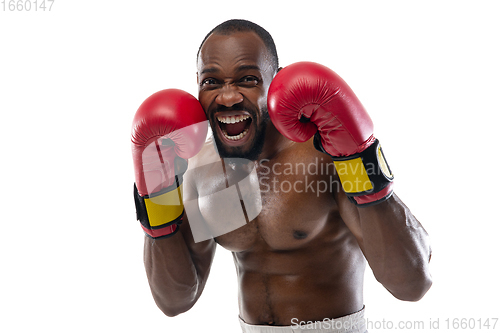 Image of Bright emotions of professional boxer isolated on white studio background, excitement in game