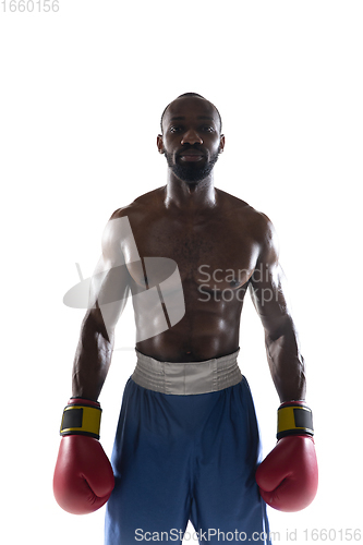 Image of Bright emotions of professional boxer isolated on white studio background, excitement in game